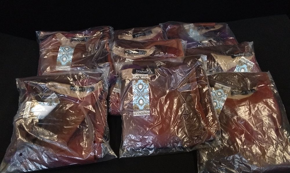Lot 189: Eight boohoo brand garments in rust burgundy and beige