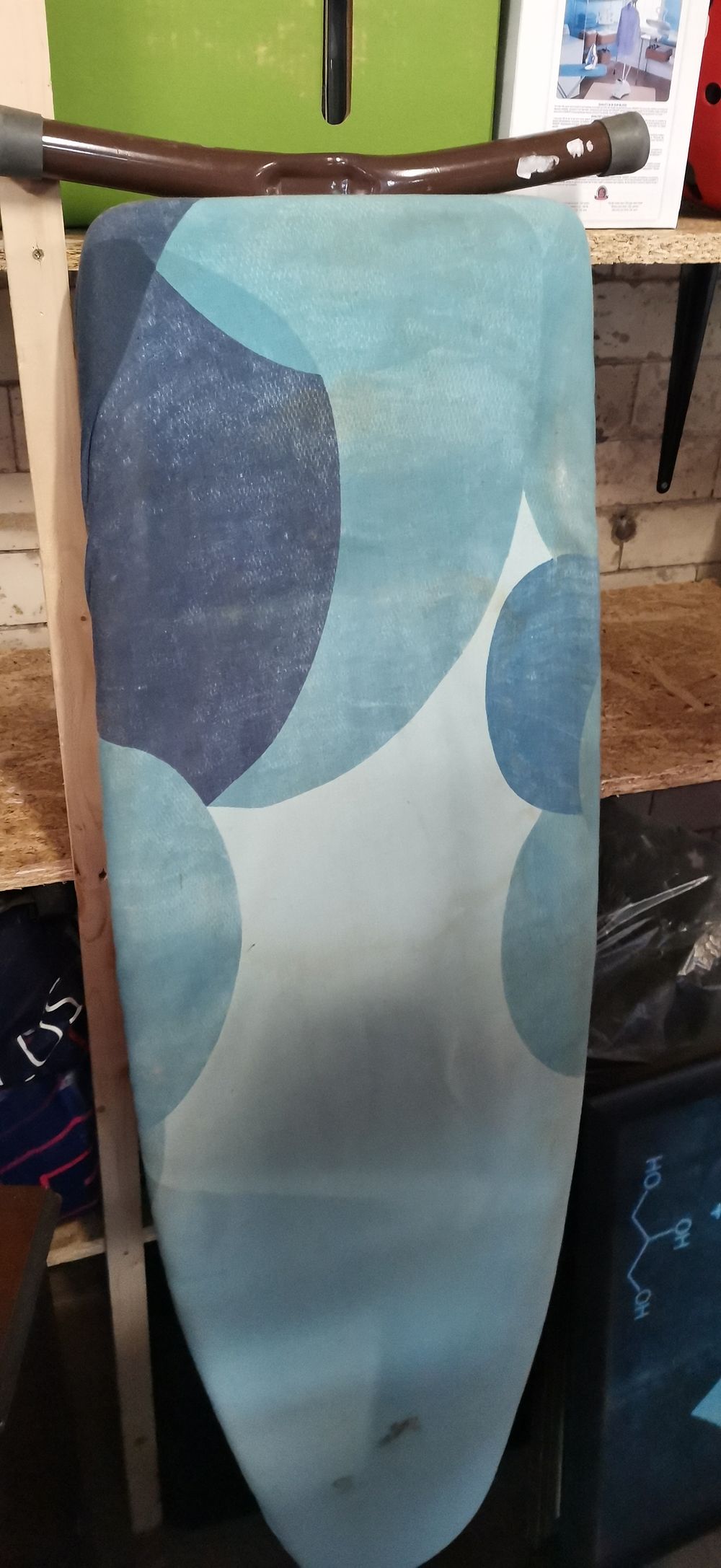 Lot 202: Ironing Board with Blue Circular Patterned Cover