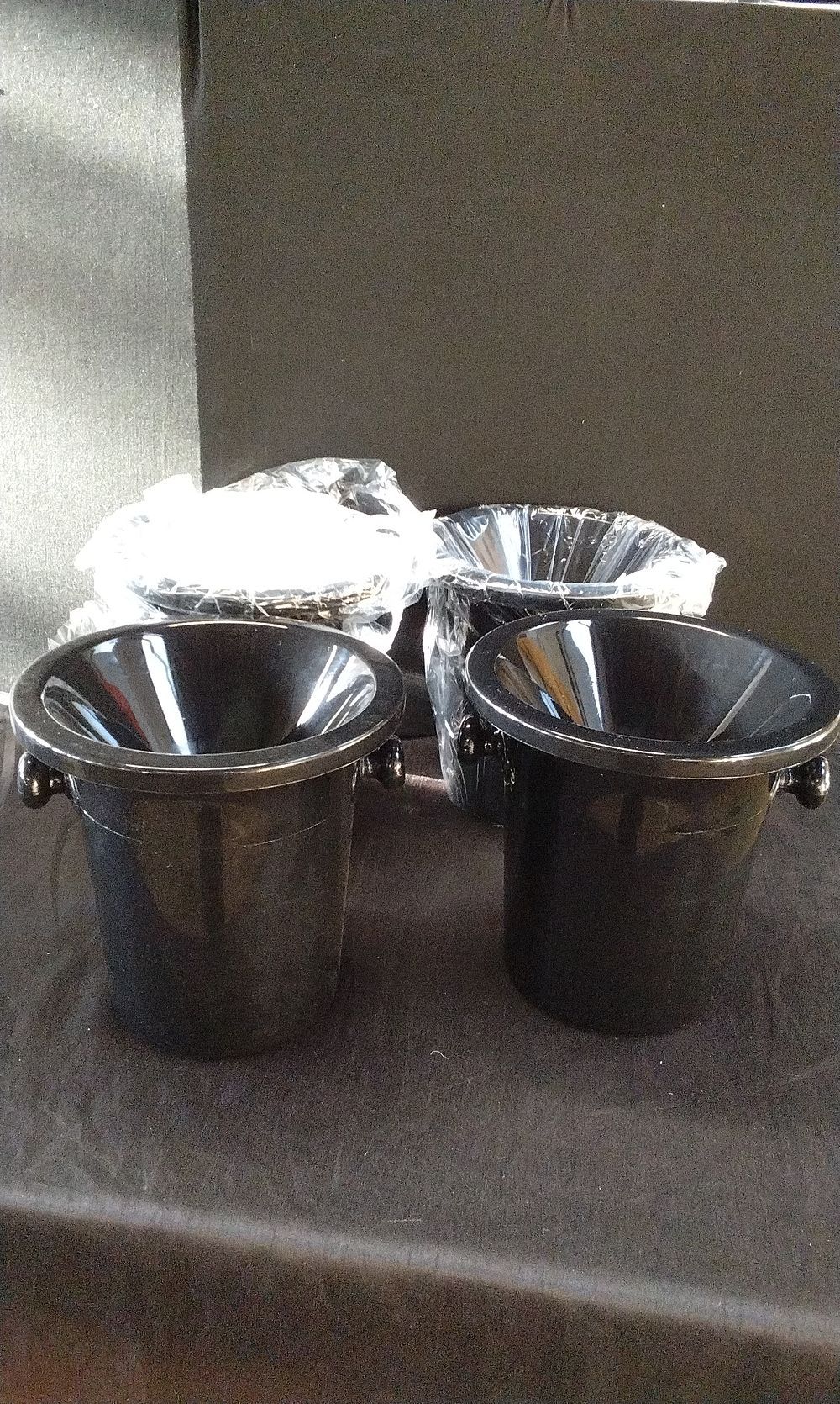 Lot 203: A Collection of Black Plastic Wine Tasting Spittoons