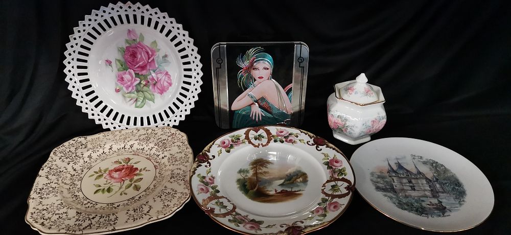 Lot 209: A Collection of Decorative Ceramic Plates and Art Deco Tin