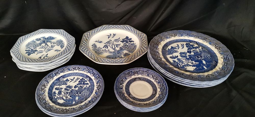 Lot 217: A Collection of Blue Willow Pattern Ceramic Plates and Saucers
