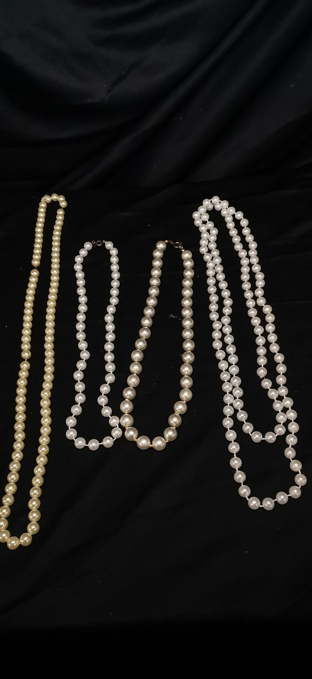 Lot 233: A Collection of Faux Pearl Bead Necklaces