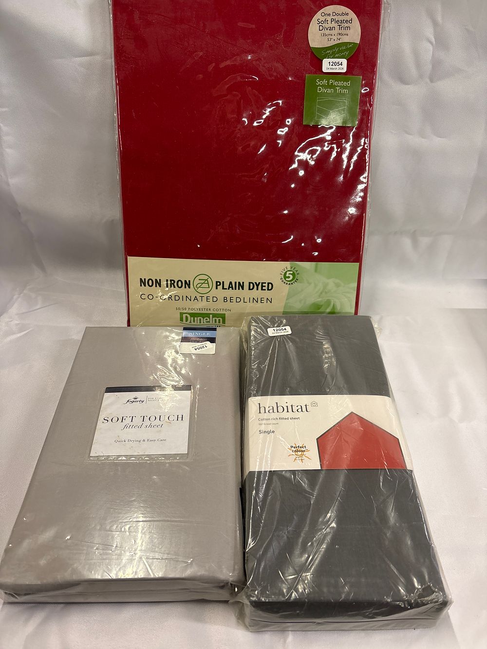 Lot 317: Three Pieces of New Bedding including Dunelm Mill Valance and Fitted Sheets