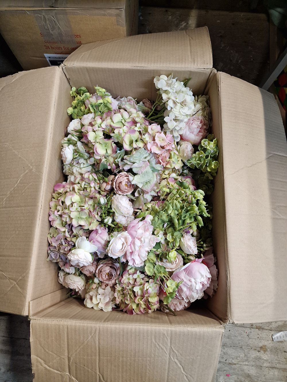 Lot 389: Selection of Decorative Imitation Flowers Wedding etc