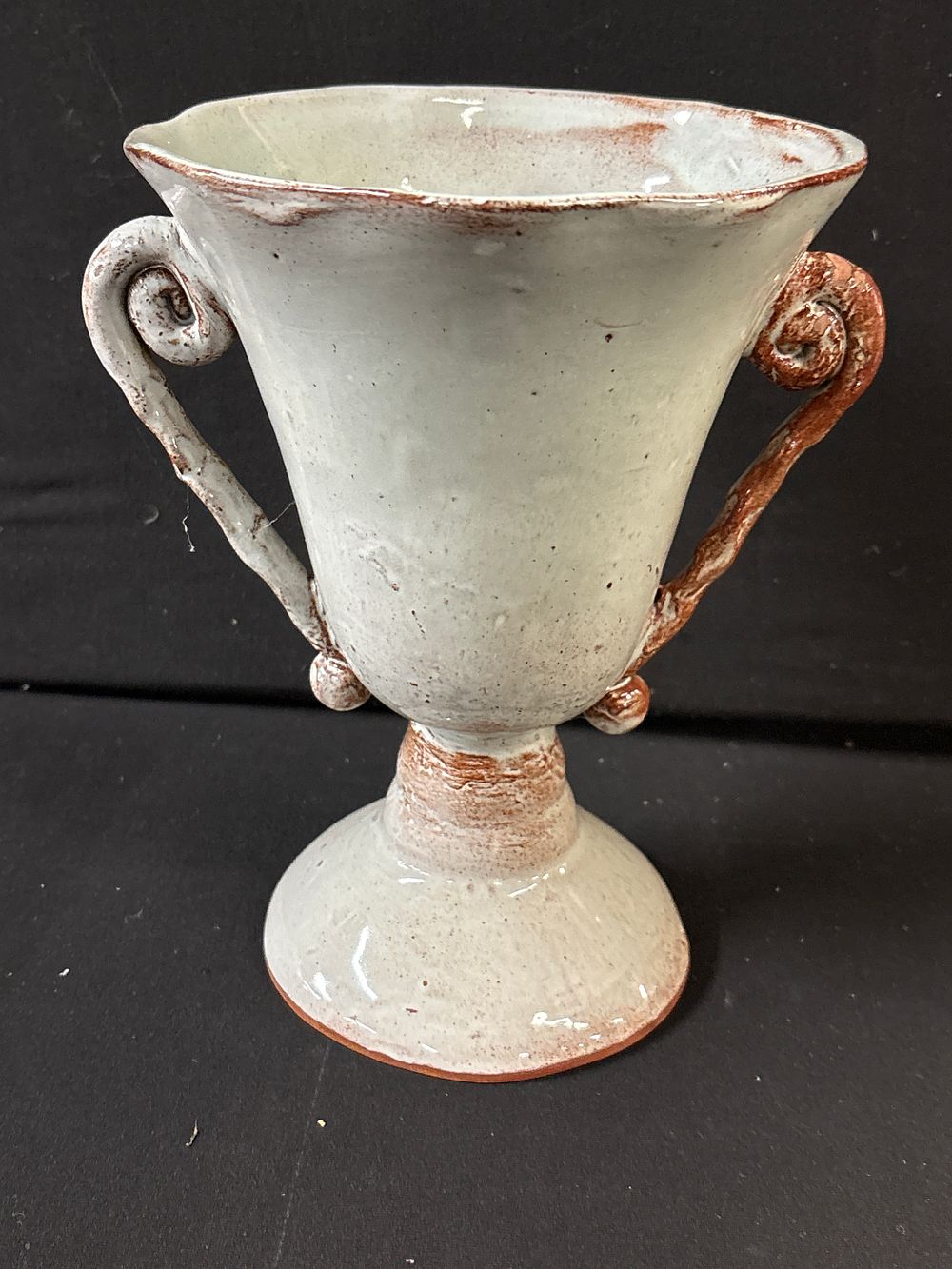 Lot 186: A Vintage Turkish Style Glazed Terracotta Twin-Handled Footed Vase