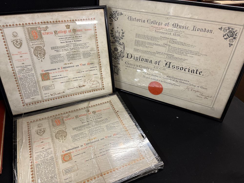 Lot 198: Victoria College of Music. A Trio of Framed Music Diplomas and Certificates. London, circa 1928.