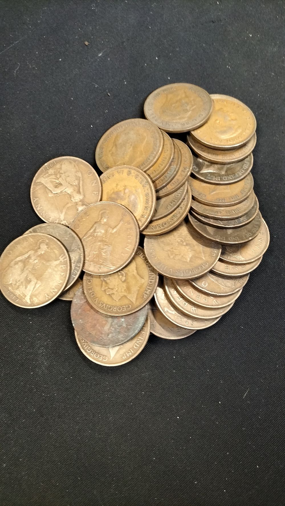 Lot 412: Thirty King George V British Bronze One Penny Coins