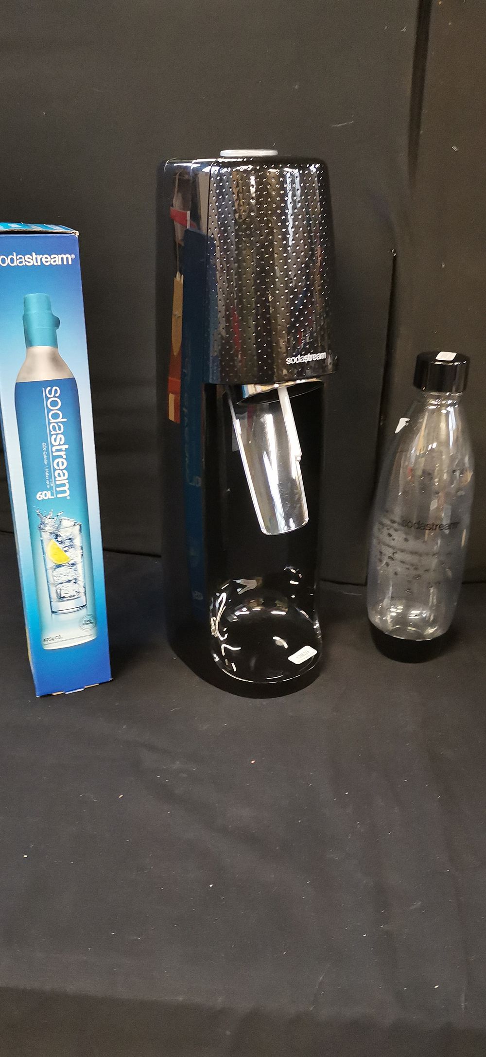 Lot 424: Three Sodastream Items Including Fizzi Sparkling Water Maker and Bottle