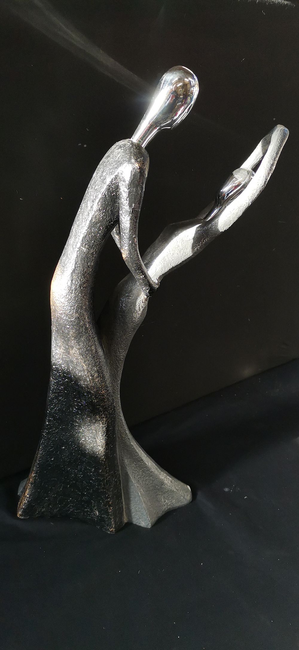 Lot 426: Modern Stylised Figurative Sculpture in Silver and Black Tones