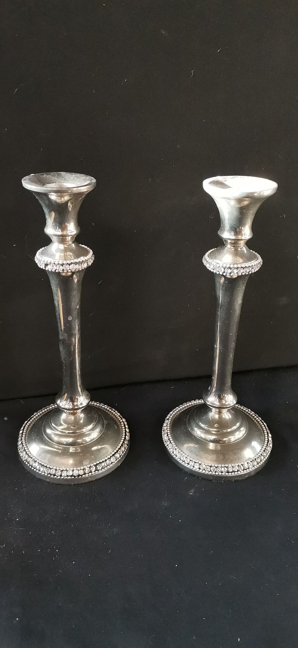 Lot 429: Multiple Silver Toned Candlesticks with Clear Stone Accents