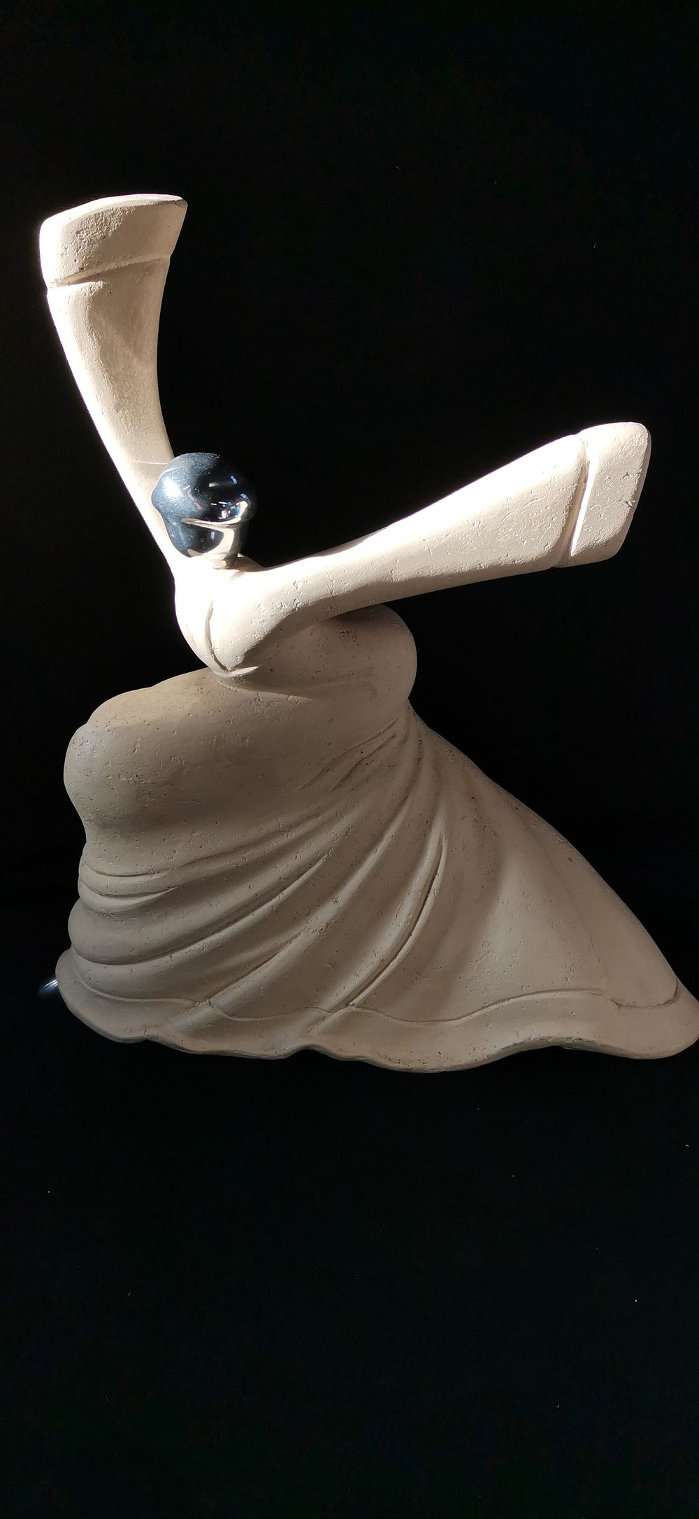 Lot 432: Stylised Cream and Silver Toned Dynamic Figure Sculpture