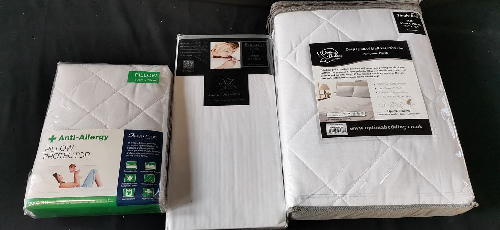 Lot 447: A Trio of White Single Bedding and Protectors