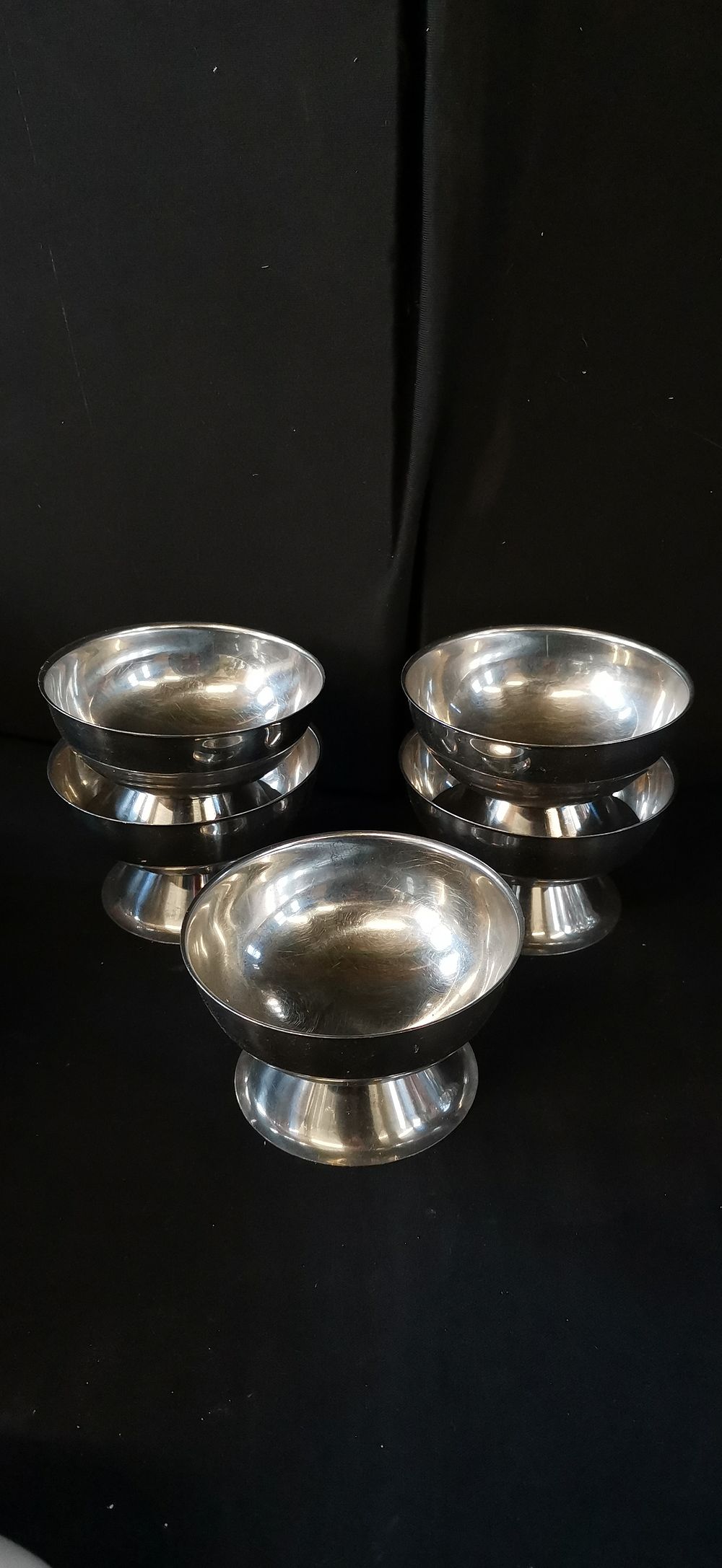 Lot 463: Five silver-toned metal footed bowls