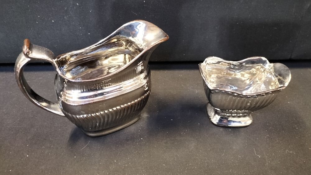 Lot 514: A Pair of 19th Century Silver Lustre Ceramic Tableware Pieces