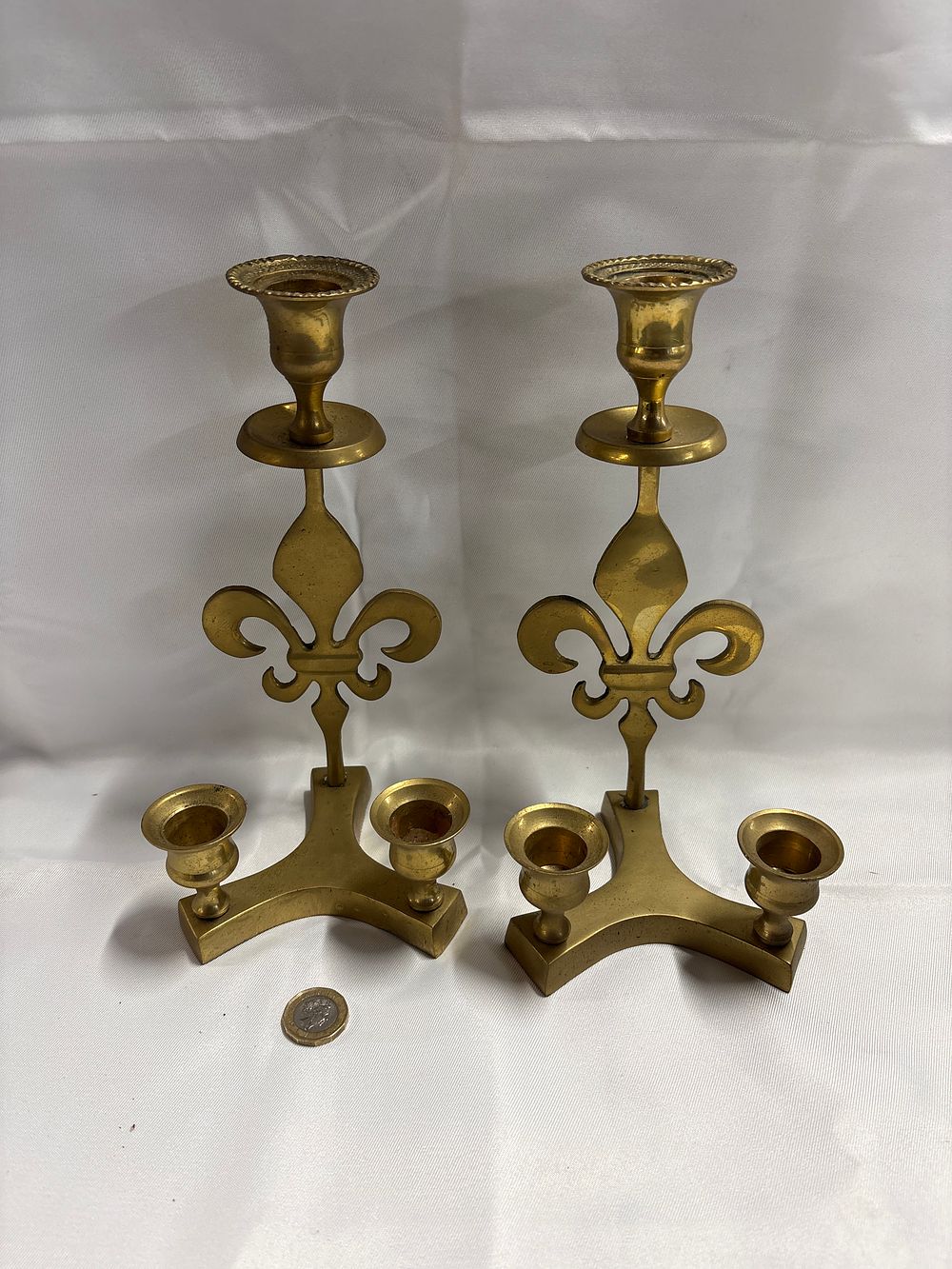 Lot 244: A Pair of Gothic Revival Brass Three-Light Candelabra