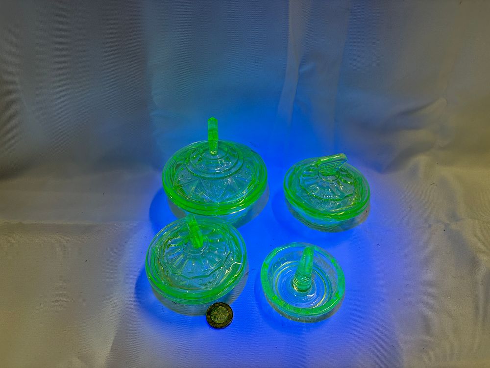 Lot 249: A Four-Piece Art Deco Uranium Glass Dressing Table Set