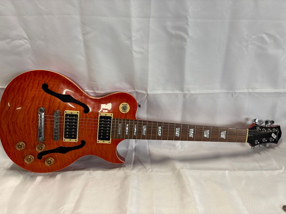 Lot 264: Mazeti Seven-String Semi-Hollow Body Electric Guitar
