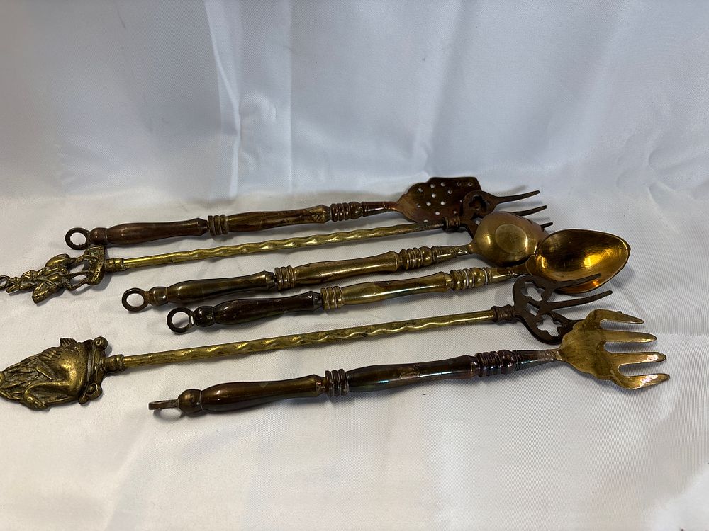 Lot 272: A Set of 6 English Brass Toasting Forks and Decorative Fireplace Utensils