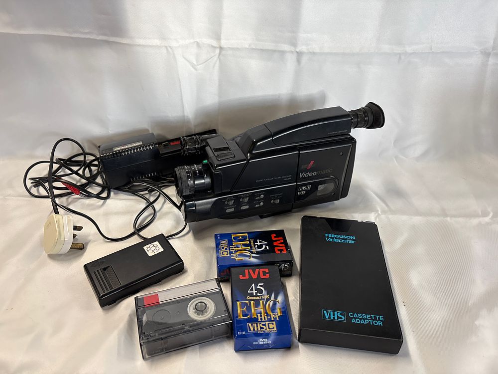 Lot 276: Amstrad Videomatic VMC200 VHS-C Camcorder with Ferguson Adaptor and JVC Cassettes