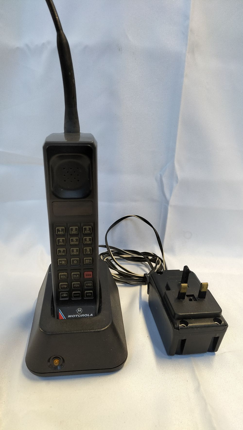 Lot 318: Motorola 8500X Vintage 1980s Brick Mobile Phone with Charging Cradle and Accessories