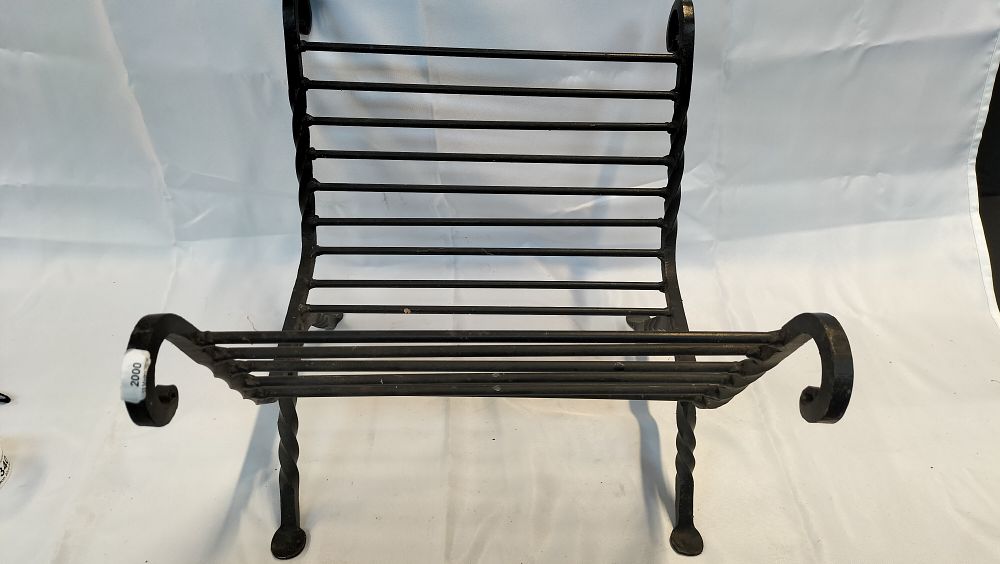 Lot 340: A 20th Century Wrought Iron Slatted Log Cradle
