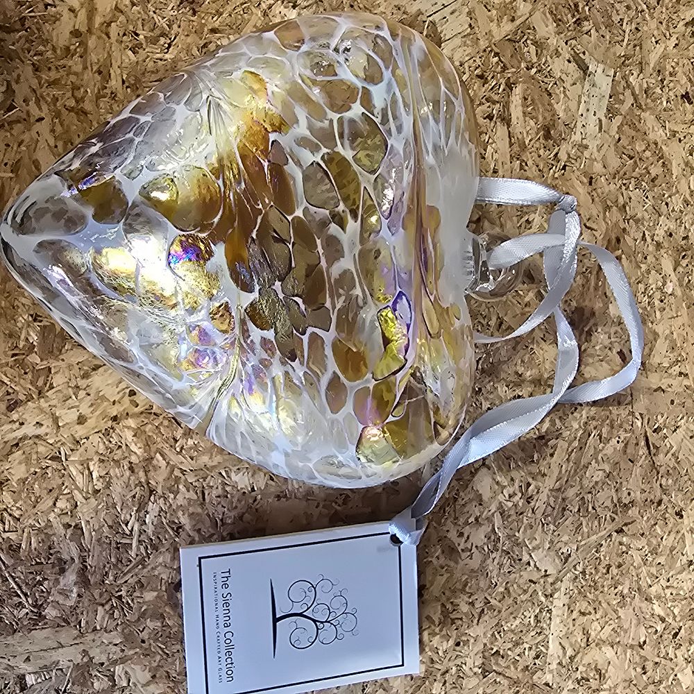 Lot 303: A Sienna Glass Hand-Blown Iridescent Friendship Heart Ornament