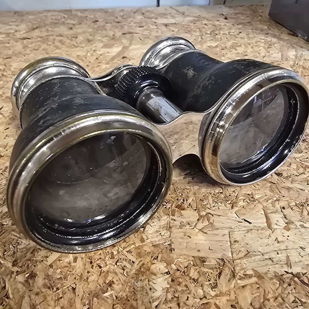 Lot 304: A pair of Le Jockey Club Paris nickel plated field glasses