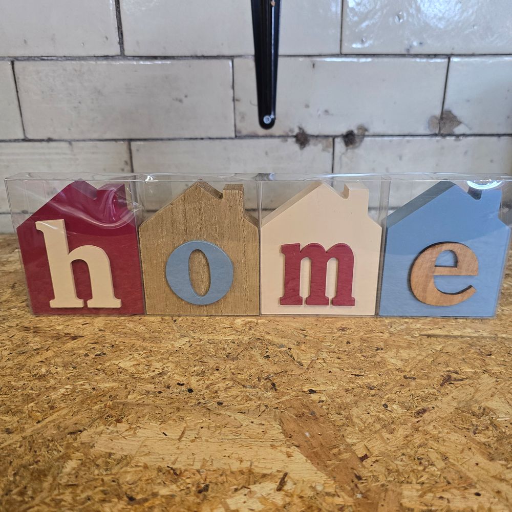 Lot 312: A Set of Four Contemporary Century House Decorative Wooden Home Blocks