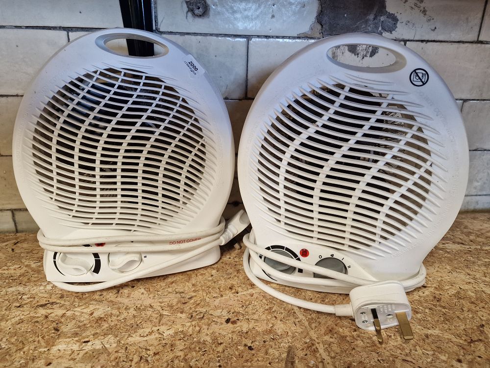 Lot 243: A Pair of Portable Electric Fan Heaters