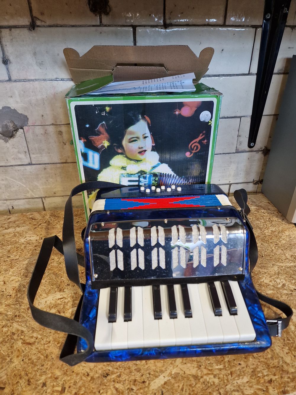 Lot 263: Student 17-key 8-bass piano accordion in blue pearloid finish