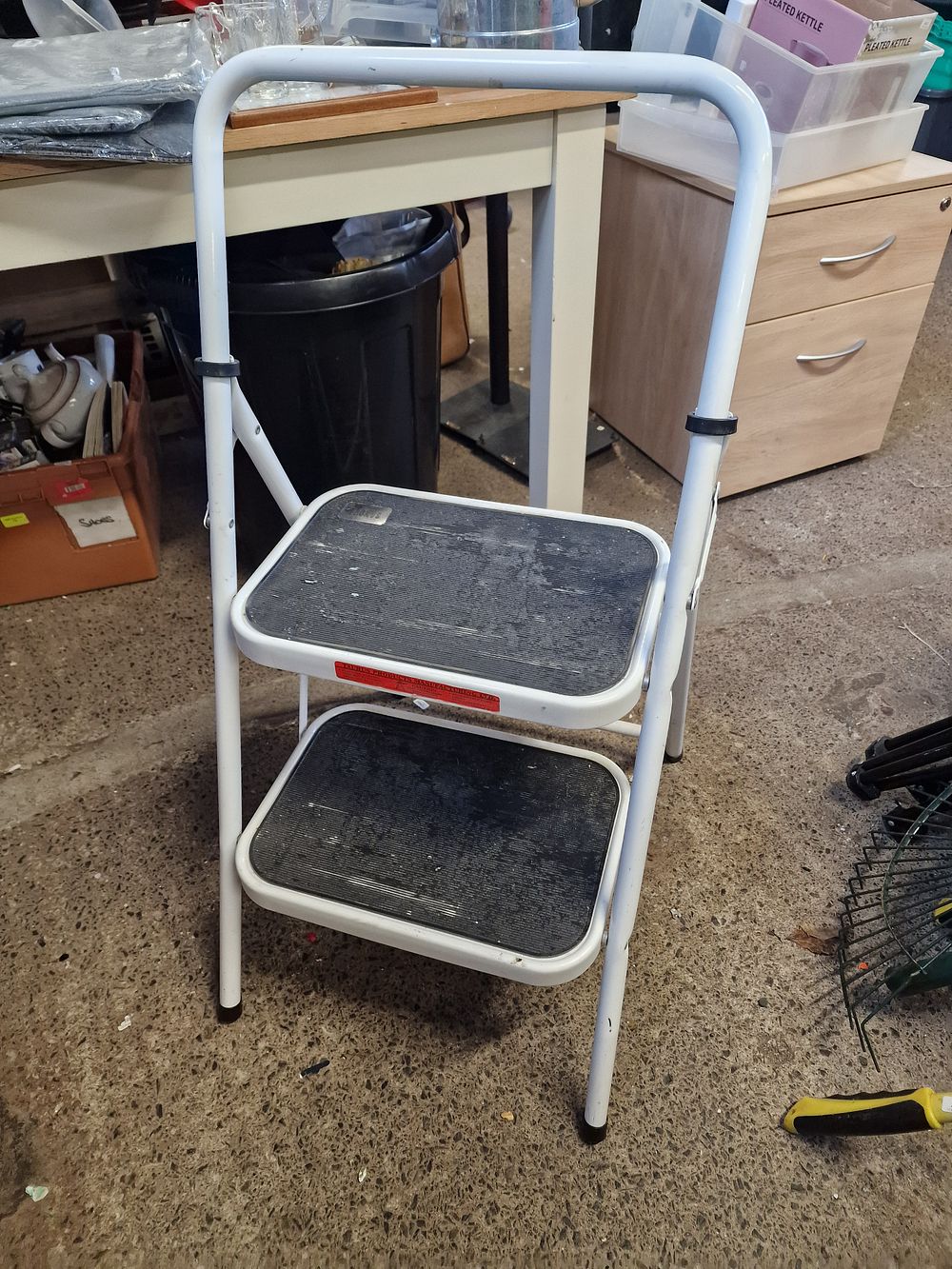 Lot 275: A Taurus Products Manufacturing Ltd white metal two-step folding stepladder