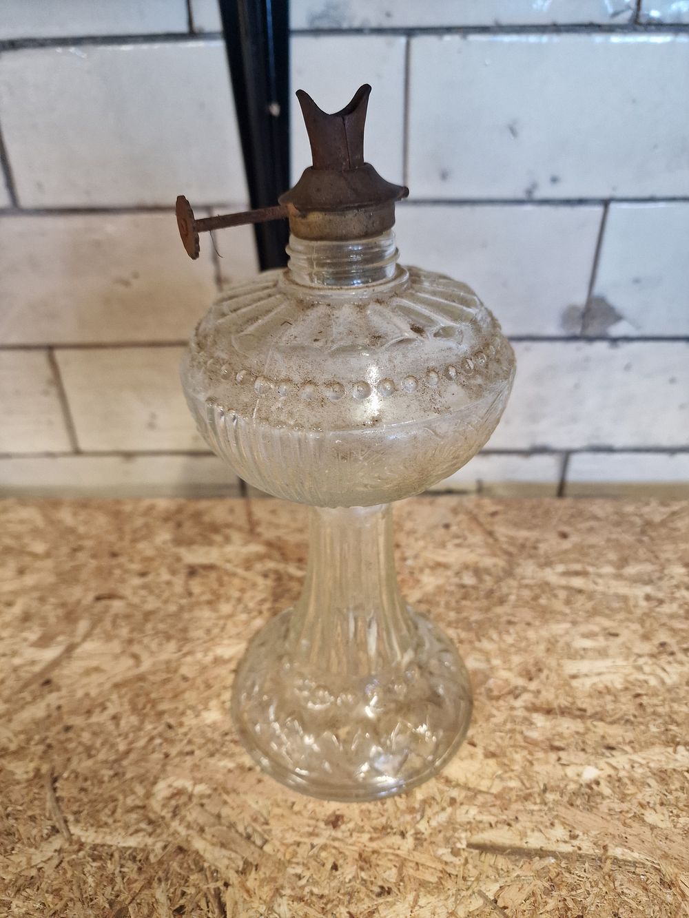Lot 297: Late Victorian Clear Pressed Glass Oil Lamp with Beaded Decoration