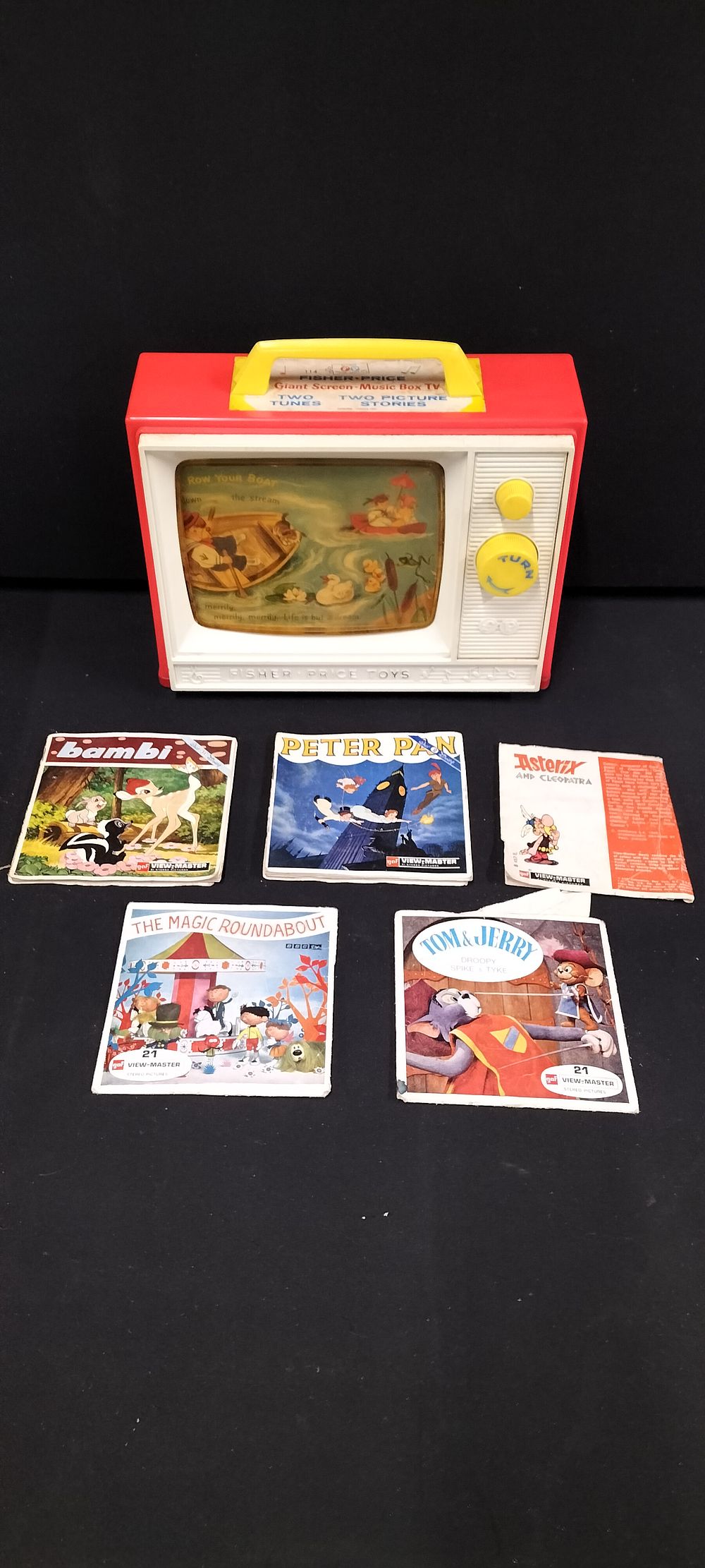 Lot 290: Six Vintage Children's Toys, 5 gaf View master Reel Sets and a Fisher Price Toys Two Tune T.V.