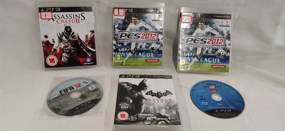 Lot 155: A Collection of Sony PlayStation 3 Video Games including Pro Evolution Soccer 2012 and Assassin's Creed II
