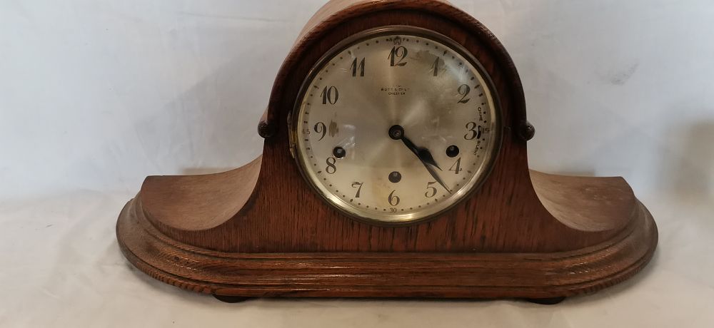 Lot 188: A Mid-20th Century Oak Napoleon Hat Mantel Clock by Junghans Retailed by Butt & Co. Ltd. Chester. No Key