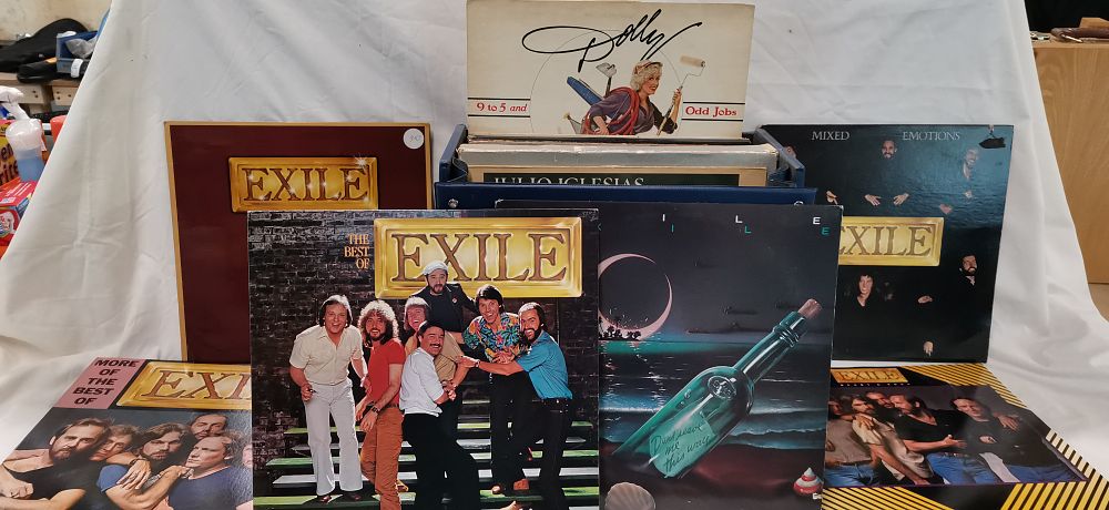 Lot 219: A Collection of Exile and Other Artists Vinyl LP Records in a Blue Storage Case