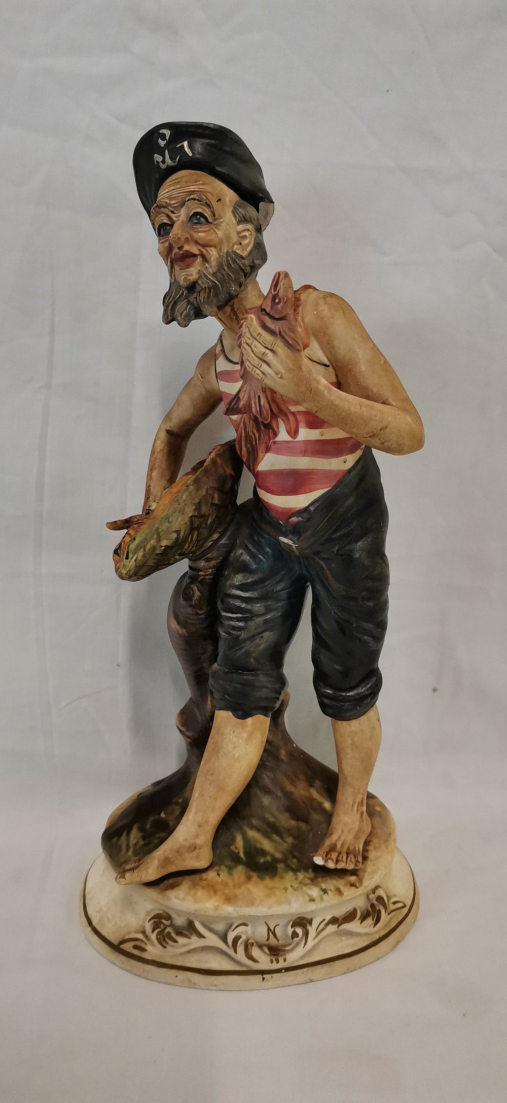 Lot 231: Capodimonte Polychrome Bisque Porcelain Figurine of a Fisherman