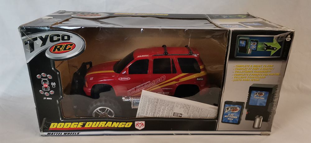 Lot 249: Tyco RC Mattel Wheels Dodge Durango Radio Controlled Model Vehicle with Original Box