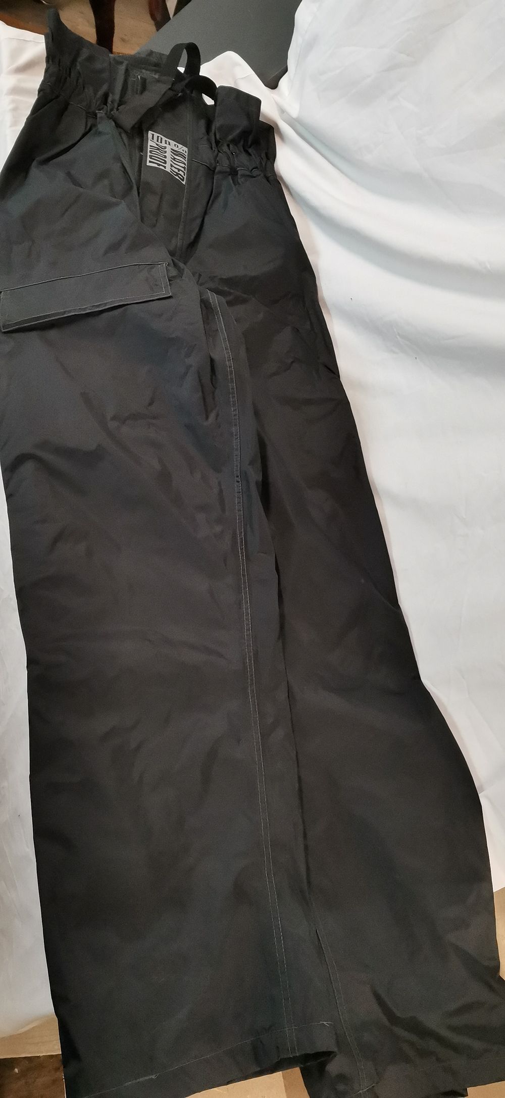 Lot 270: Frank Thomas Aqua Black Waterproof Bib and Brace Salopettes Size M