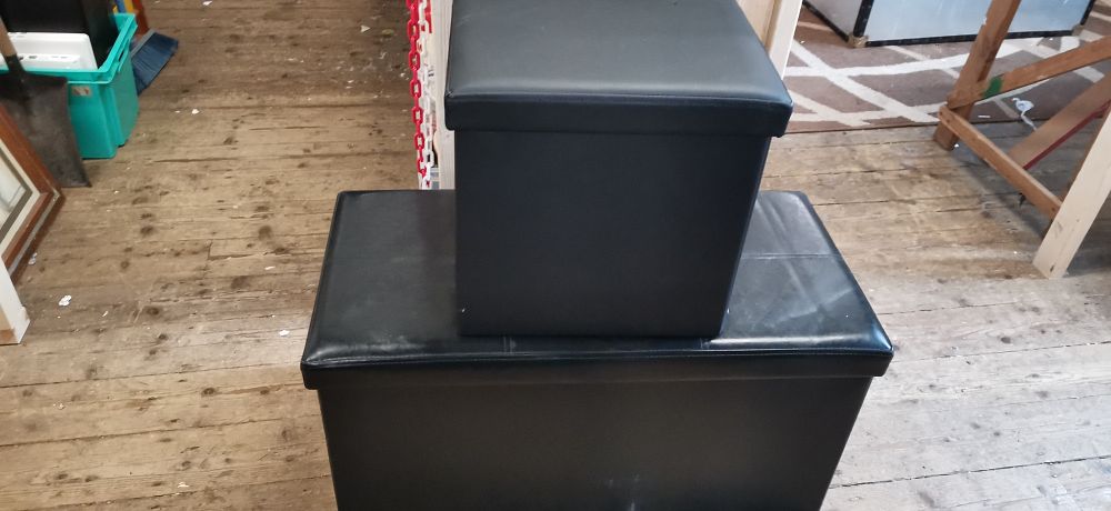 Lot 275: A Pair of Contemporary Black Faux Leather Collapsible Storage Ottoman. COLLECTION ONLY