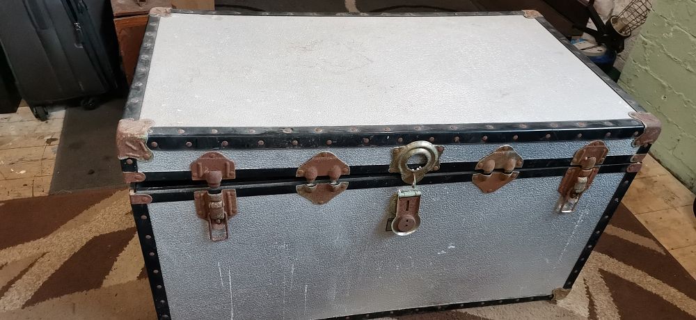 Lot 276: A Mid-20th Century Stucco Aluminium Clad Traveling Trunk. COLLECTION ONLY