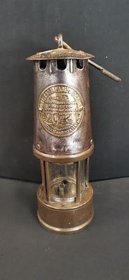 A Protector Lamp & Lighting Co. Ltd. Type SL Miner's Safety Lamp. A British miner's flame safety 