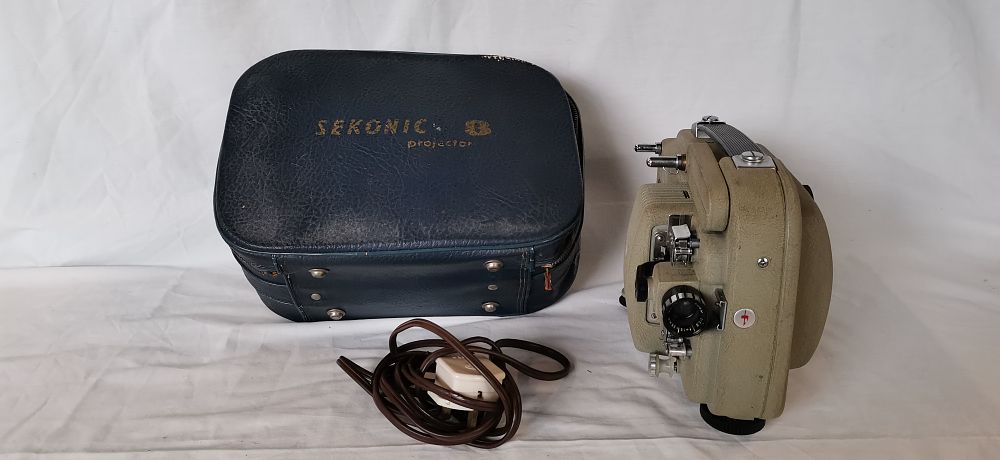 Lot 551: Sekonic Model 80P 8mm Motion Picture Film Projector with Case.