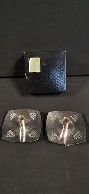 A Pair of Mid-Century Modern Silver-Plated Tripod Candle Holders by Angora. A pair of 