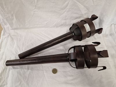 A Pair of Wrought Iron Decorative Torches in the Medieval Style. A pair of decorative torches or 