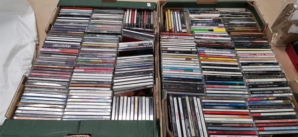Lot 328: A Large Collection of Approximately 150-200 CDs Featuring Pop, Rock, and Classical Crossover Artists