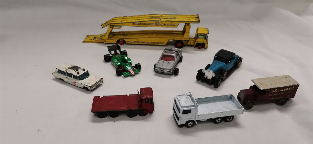 Lot 332: A Collection of Eight Vintage Die-Cast Toy Vehicles including Matchbox and Majorette. Play-worn