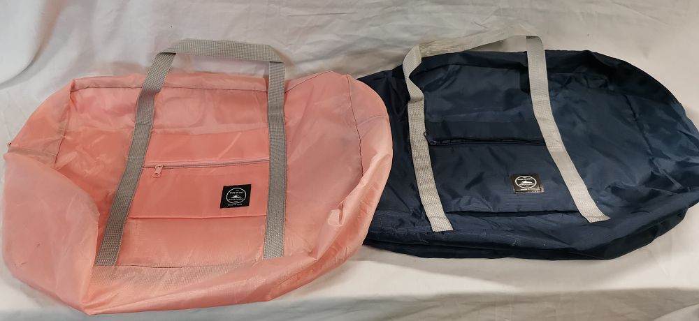 Lot 358: A Pair of Wind Blows River Flows Foldable Travel Duffel Bags