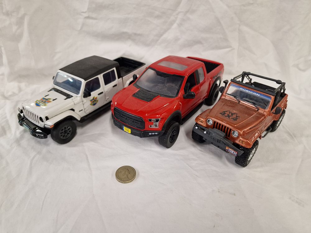 Lot 412: Three Model Off-Road Vehicles including Ford F-150 Raptor and Jeep Rubicon