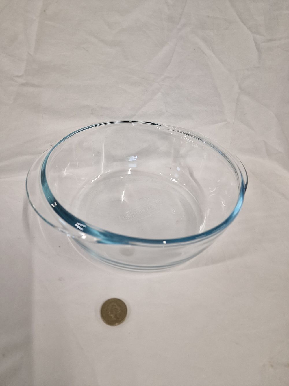 Lot 416: A Pyrex clear glass mixing bowl made in France